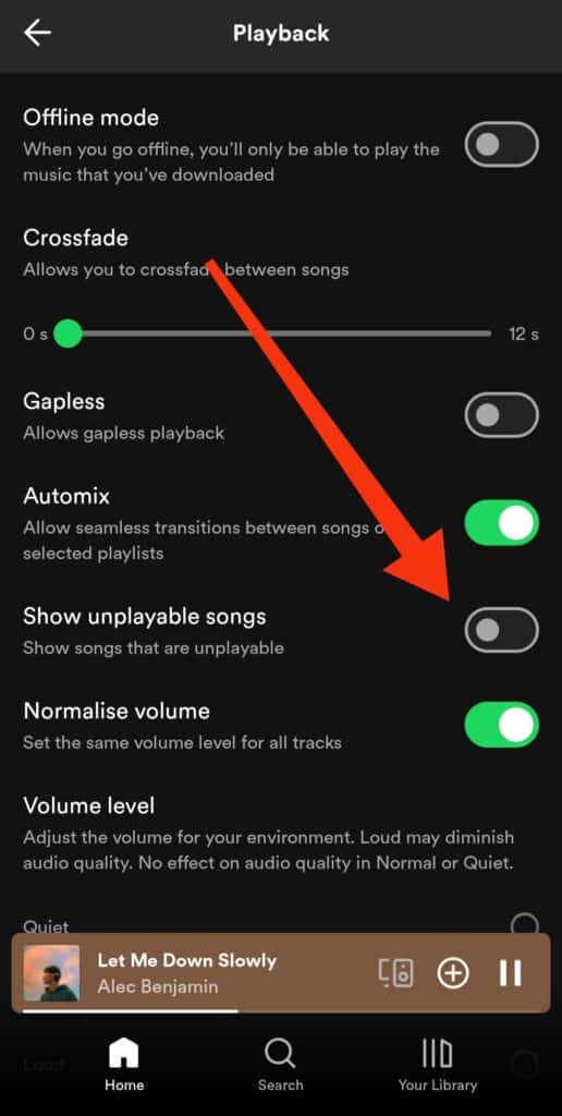 Turn off the “Hide Unplayable Songs” feature in Spotify app